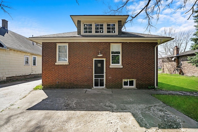 rear view of property with a patio area