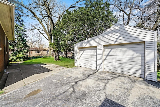 garage with a yard