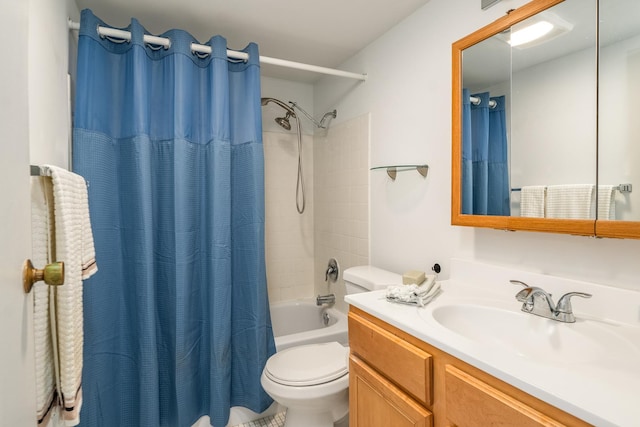 full bathroom with vanity, toilet, and shower / bath combo