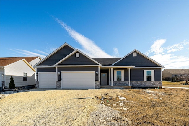 craftsman-style home featuring a garage