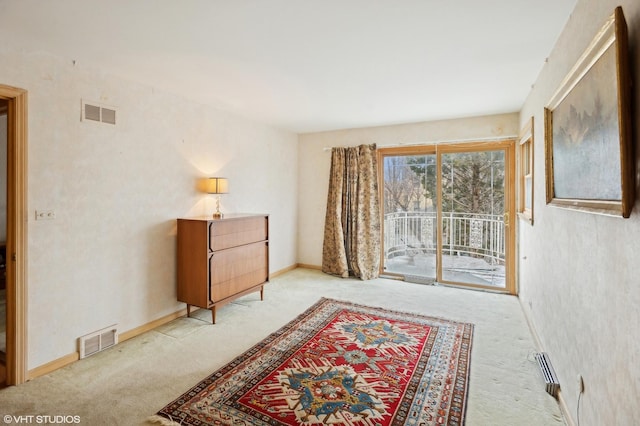 sitting room with light colored carpet