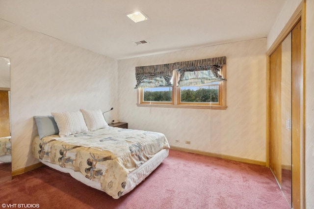 bedroom featuring carpet