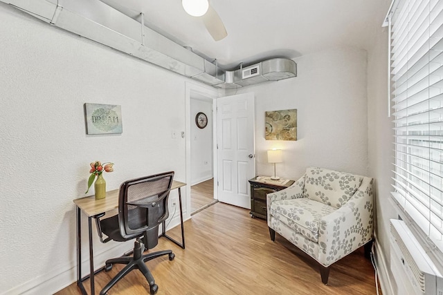 office space featuring light hardwood / wood-style floors