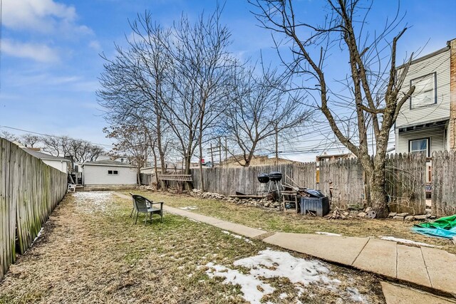 view of yard covered in snow