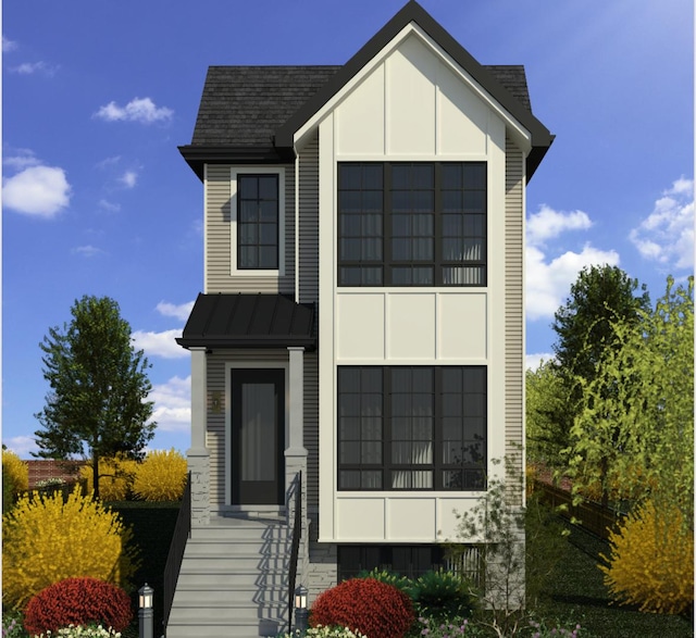 modern home with metal roof and a standing seam roof