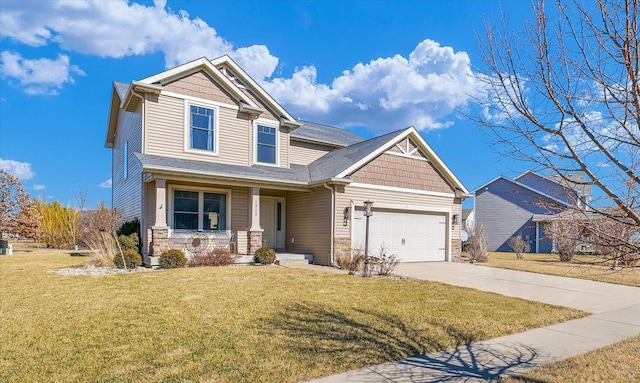 craftsman-style home with stone siding, concrete driveway, an attached garage, and a front lawn