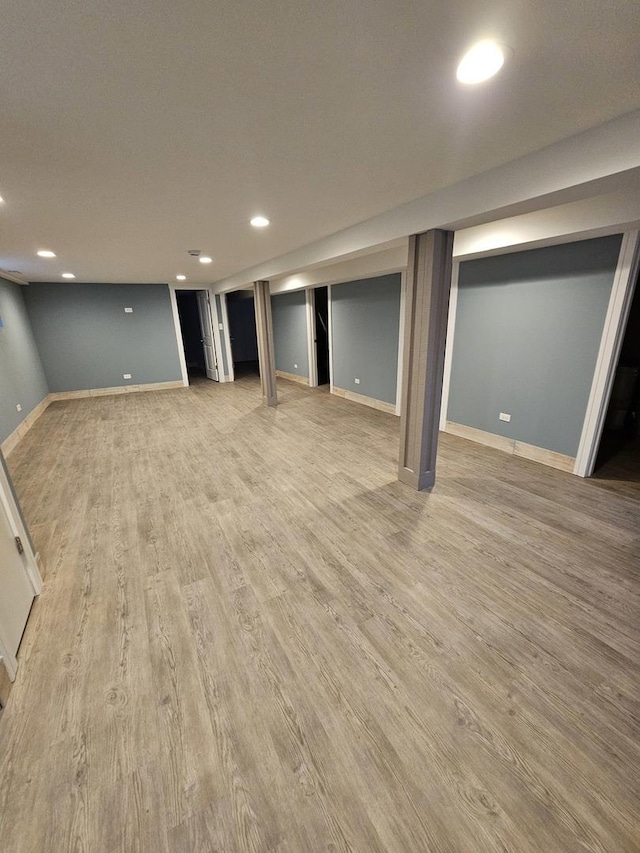 basement featuring light hardwood / wood-style flooring