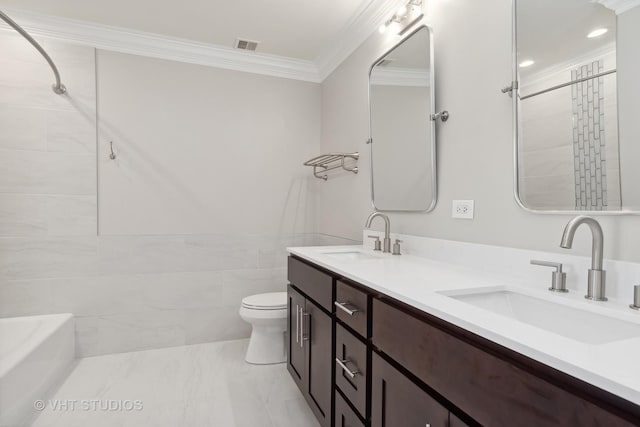 bathroom with crown molding, tile walls, vanity, and toilet