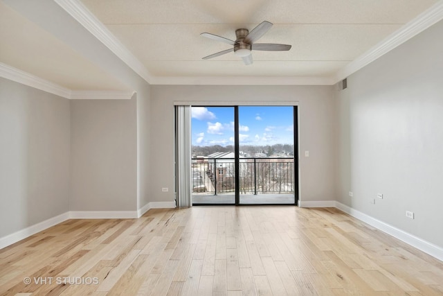 empty room featuring crown molding, ceiling fan, and light hardwood / wood-style flooring