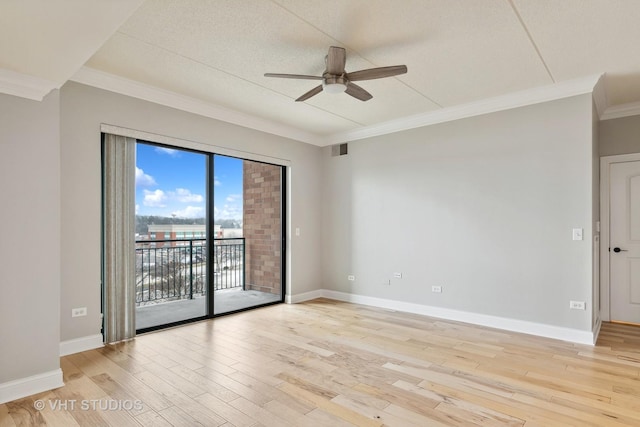 empty room with ceiling fan, ornamental molding, and light wood-type flooring