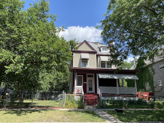 view of front of house with a front lawn and a porch