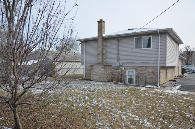 view of snow covered property