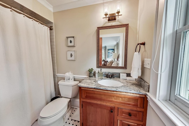 bathroom featuring toilet, vanity, tile patterned floors, ornamental molding, and a shower with shower curtain