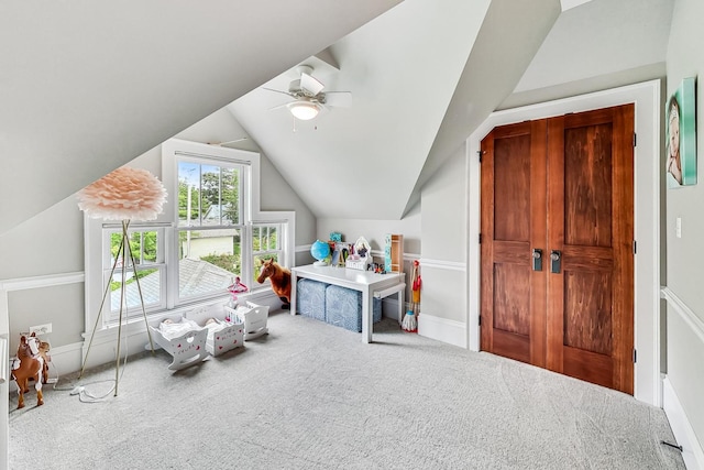 rec room featuring ceiling fan, carpet, and lofted ceiling