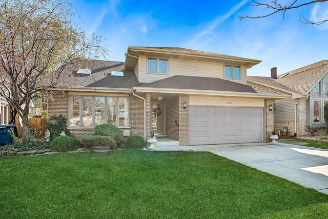 view of front of house featuring a garage and a front yard