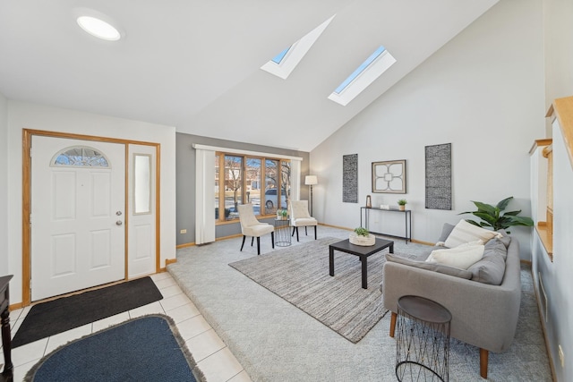 tiled living room featuring a skylight and high vaulted ceiling