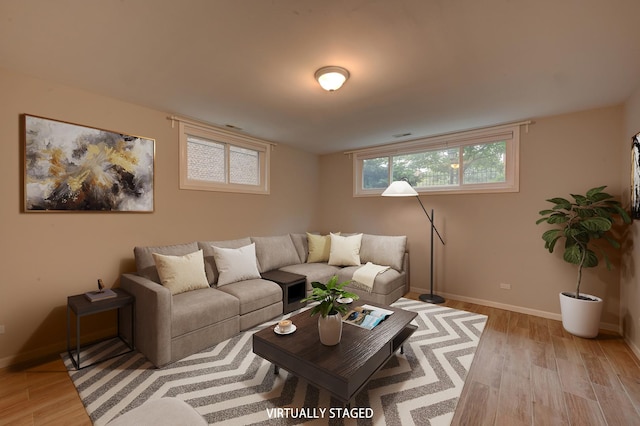 living room with light hardwood / wood-style floors