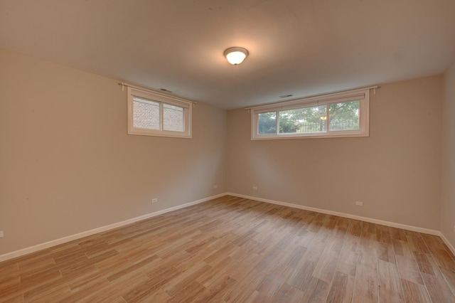 basement with light wood-type flooring