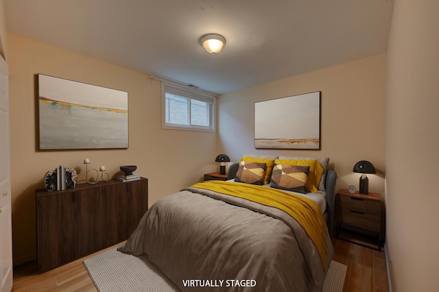 bedroom featuring light wood-type flooring