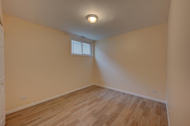 spare room featuring light wood-type flooring