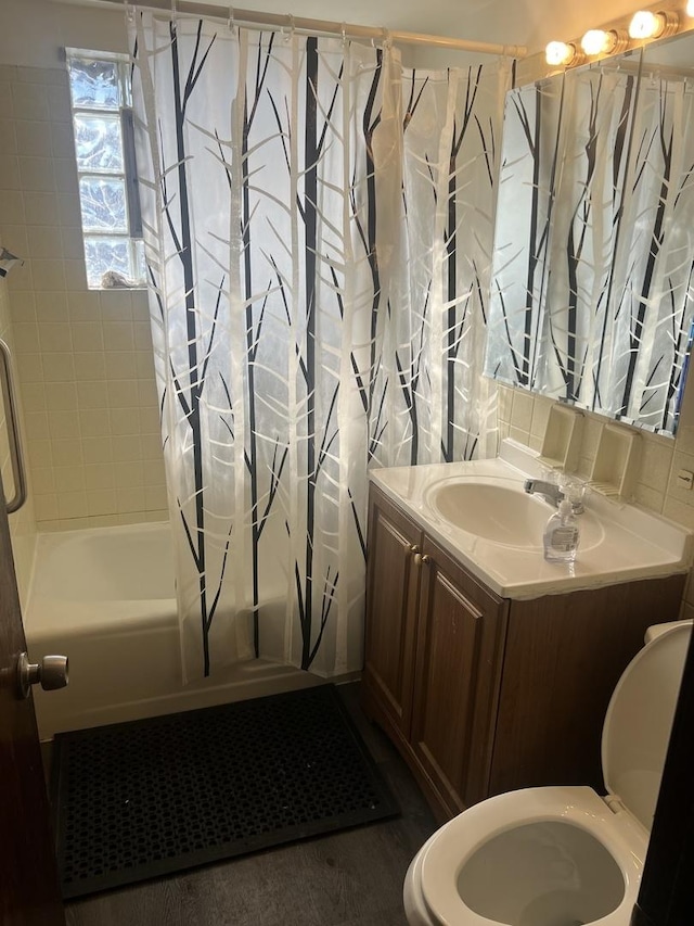 bathroom with vanity and shower / bathtub combination with curtain