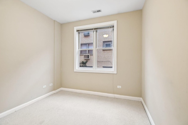 empty room featuring carpet flooring