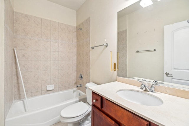 full bathroom featuring vanity, toilet, and tiled shower / bath