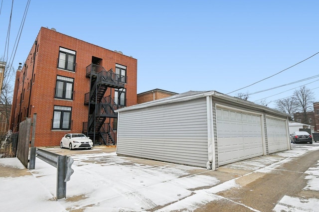 view of snow covered garage