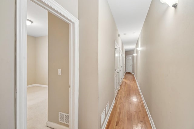 hall featuring light hardwood / wood-style floors