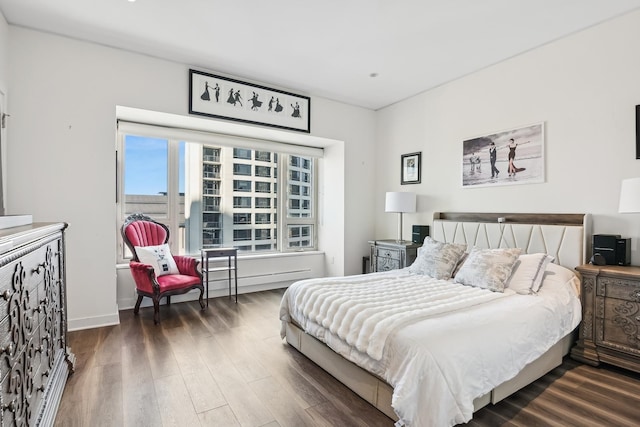 bedroom featuring dark hardwood / wood-style floors