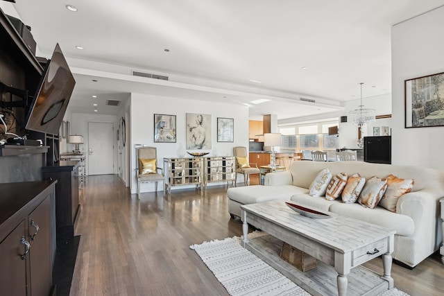 living room with dark hardwood / wood-style floors