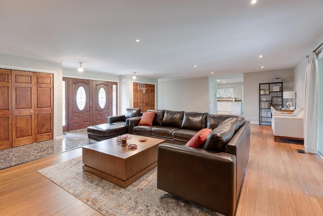 living room featuring light wood-type flooring