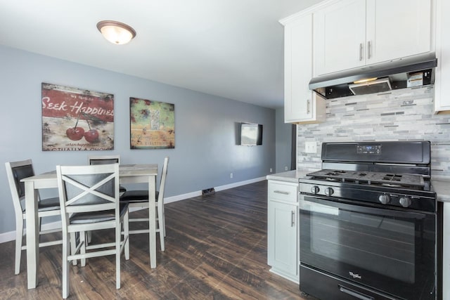 kitchen with backsplash, white cabinets, dark hardwood / wood-style flooring, and black gas range