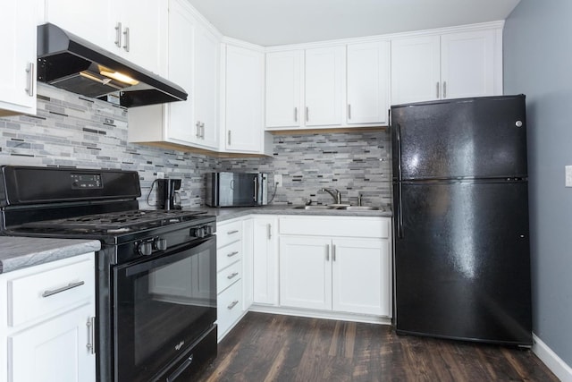 kitchen featuring decorative backsplash, dark hardwood / wood-style flooring, black appliances, white cabinets, and sink