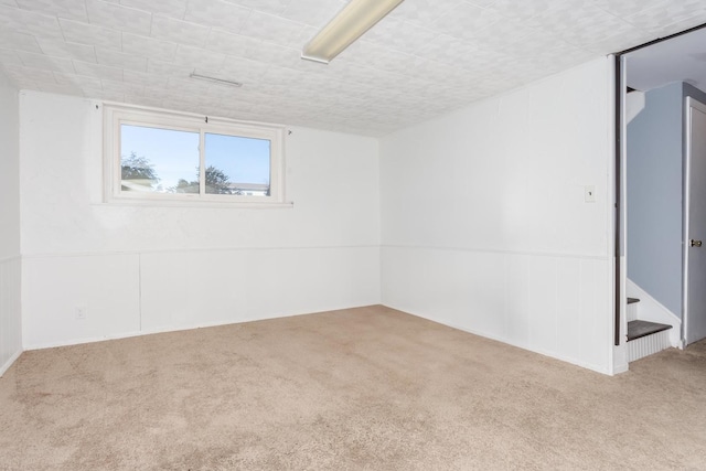 unfurnished room with carpet floors