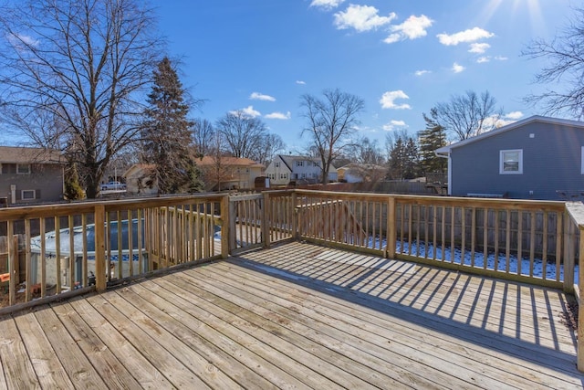 wooden deck with a water view