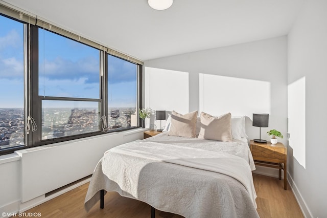 bedroom featuring hardwood / wood-style flooring