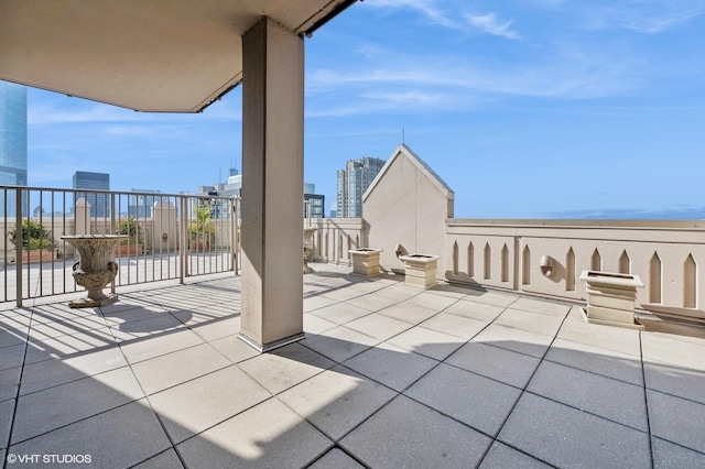 view of patio / terrace with a balcony