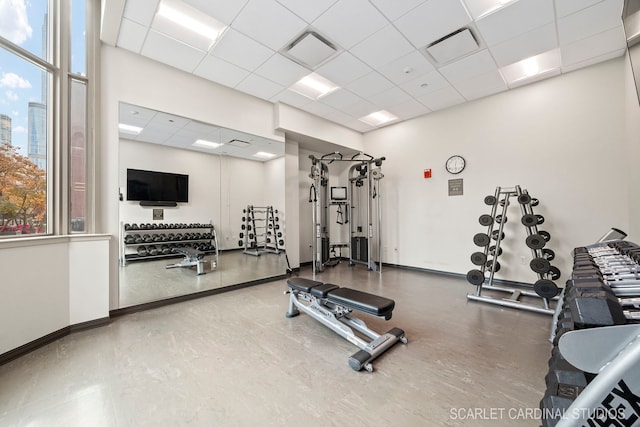 gym featuring a drop ceiling