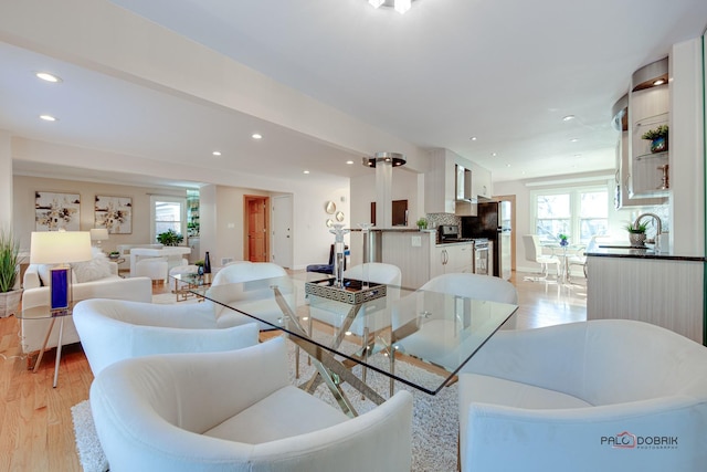 dining room featuring light wood-type flooring