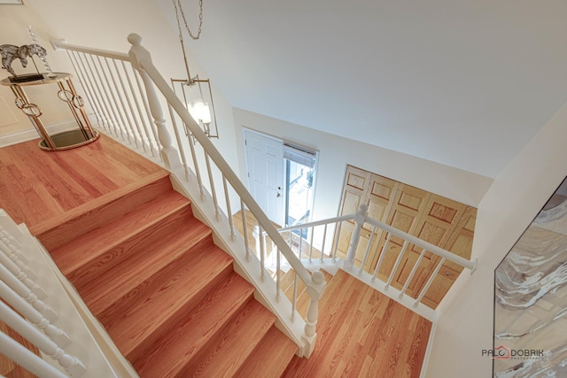 stairway featuring hardwood / wood-style floors