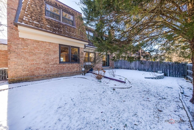 view of yard covered in snow