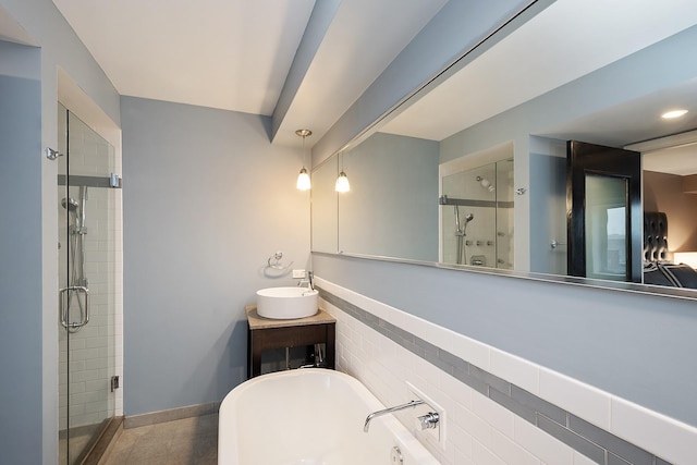 bathroom with vanity and plus walk in shower