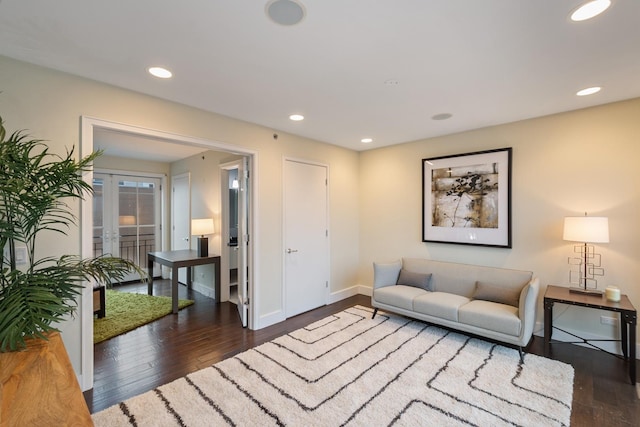 living room featuring dark wood-type flooring