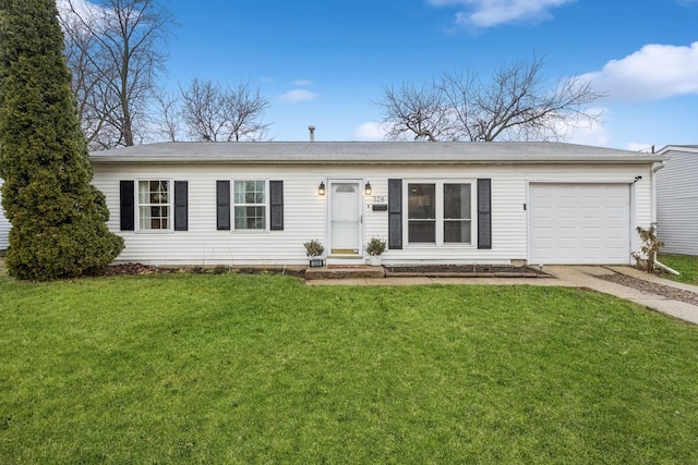 ranch-style home featuring a front lawn and a garage