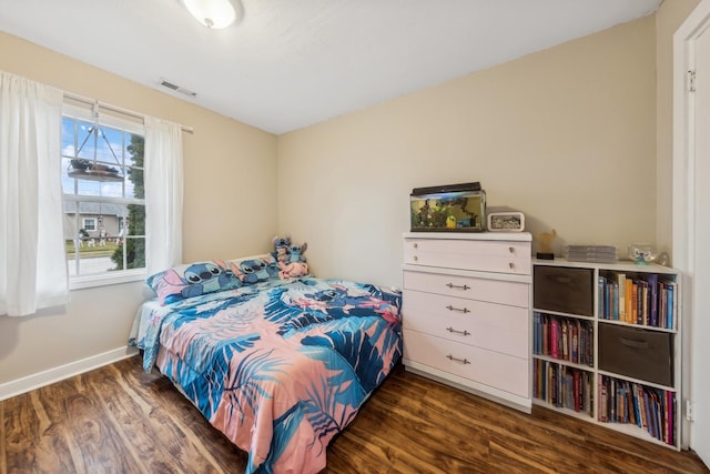 bedroom featuring dark hardwood / wood-style floors