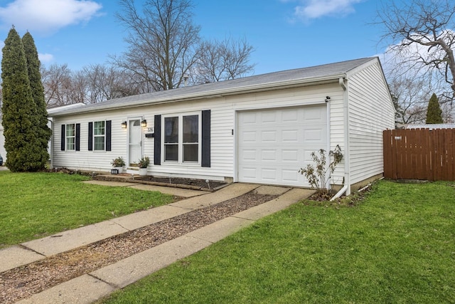 ranch-style home featuring a front lawn and a garage