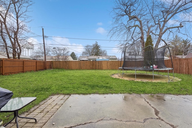 view of yard featuring a trampoline