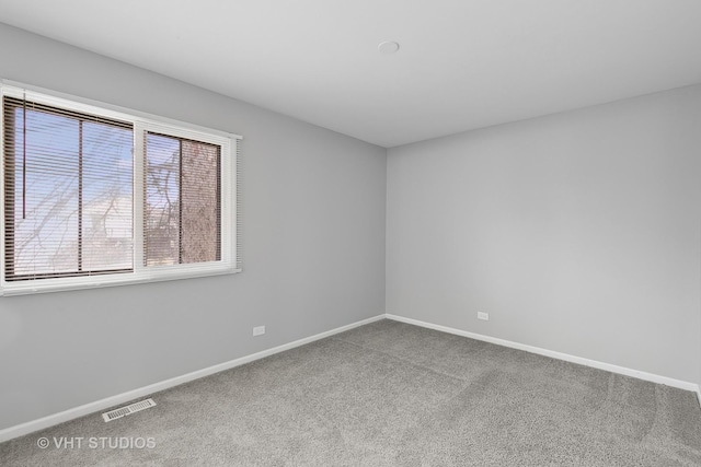 view of carpeted spare room