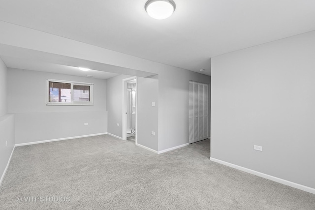 empty room with carpet flooring